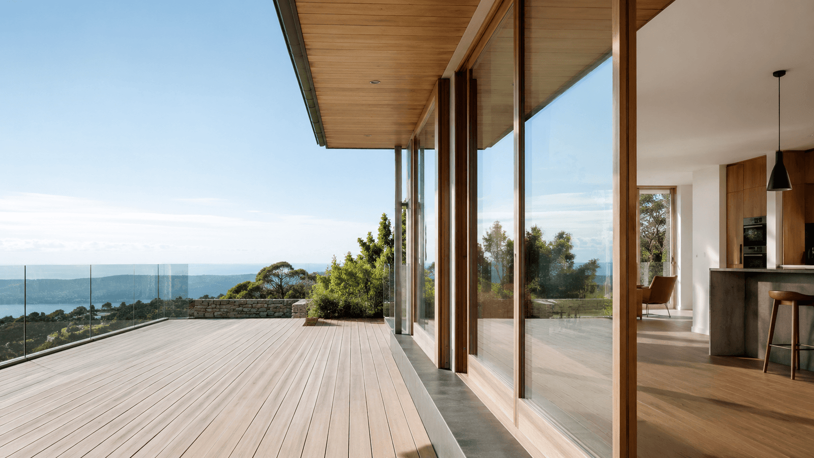 Custom joinery and full-height glazing in a Prime Core living room